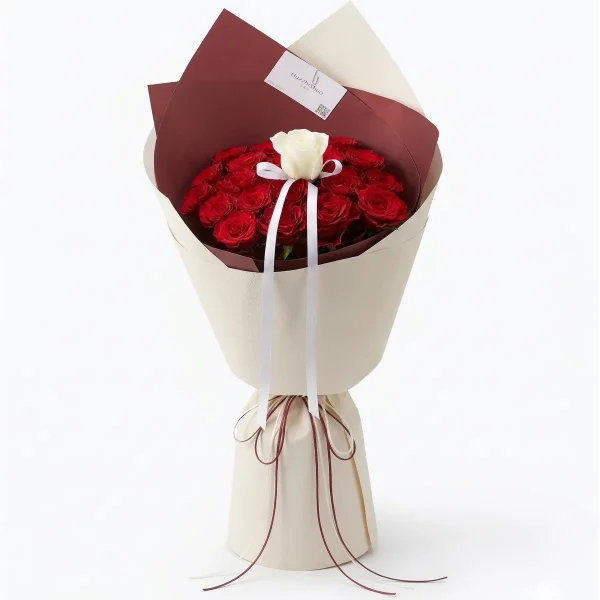 19 Red Roses with White Center Detailed close-up of fresh 19 red roses and the focal white rose center, showing the premium quality and vibrant colors of our flowers for China delivery.