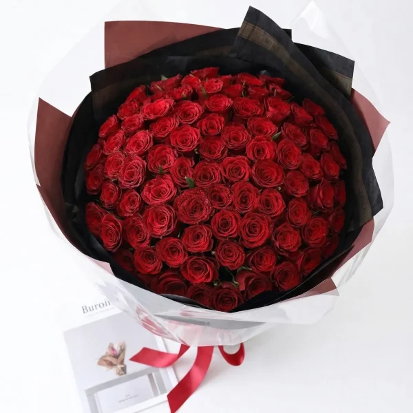 Send Flowers to Beijing | Same-Day Delivery China Close-up detail of fresh 99 red rose petals, showing the rich velvet texture and premium quality of our blooms for professional China flower delivery.