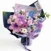 dreamy purple lily lavender rose mixed bouquet A stunning mixed bouquet featuring large purple lilies, lavender roses, and carnations, wrapped in elegant deep blue and violet paper. Ideal for luxury flower delivery in China.