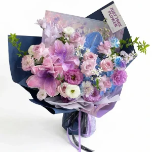 dreamy purple lily lavender rose mixed bouquet A stunning mixed bouquet featuring large purple lilies, lavender roses, and carnations, wrapped in elegant deep blue and violet paper. Ideal for luxury flower delivery in China.