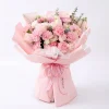 graceful pink carnation rose bouquet main Frontal view of a sweet pink carnation and rose bouquet in soft pink layered wrapping. Perfect Mother's Day gift for China delivery.