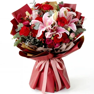 luxury red rose pink lily bouquet main A majestic luxury bouquet featuring premium red roses and pink oriental lilies in royal red and gold wrapping. Grand gift for China delivery.