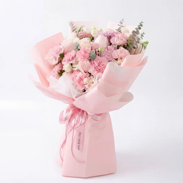 pink carnation rose bouquet side profile Side perspective of the pink carnation bouquet, highlighting the professional layered wrapping and the signature "Flowers Every Day" ribbon.