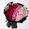 pink gradient rose pearl bouquet main Side view of the luxury ombre rose bouquet, highlighting the professional black studio-style wrapping and sleek ribbon.