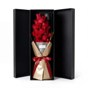 red rose luxury gift box main Frontal view of 19 premium red roses in a luxury black gift box with gold wrapping. High-end flower delivery China.