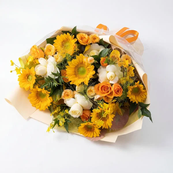 sunflower orange rose bouquet side view Side perspective of the sunflower bouquet, highlighting the champagne-colored layered wrapping and artistic orange ribbon.