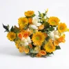 sunflower rose bouquet horizontal lay A laying-down view of the Radiant Joy mixed bouquet, showing the dense arrangement of sunflowers and various roses.