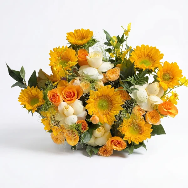 sunflower rose bouquet horizontal lay A laying-down view of the Radiant Joy mixed bouquet, showing the dense arrangement of sunflowers and various roses.